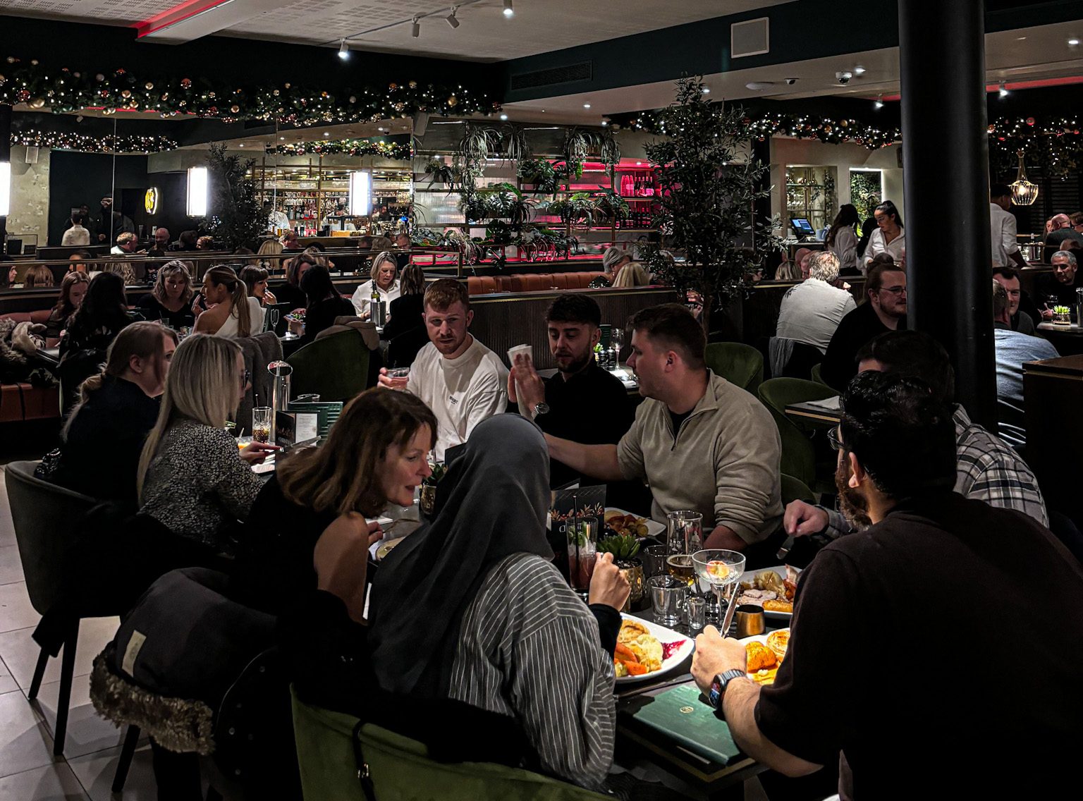 Guests enjoying festive dining at Albert's Shed restaurant in Manchester